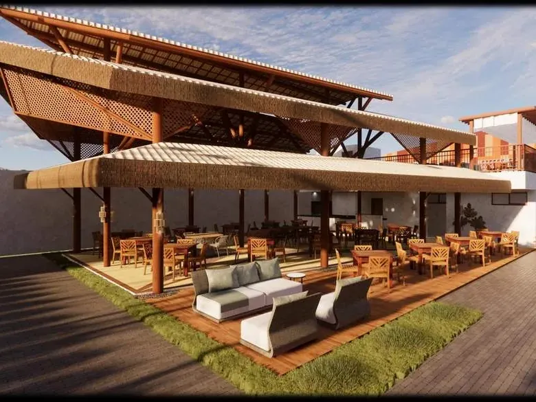 Restaurante com coberturas em palha sobre estrutura de madeira e deque